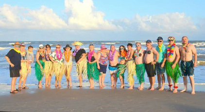 Surfside beach: photo of croatians in Hawaiian ornaments