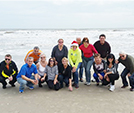 Group photo from the Galveston beach in the winter time.