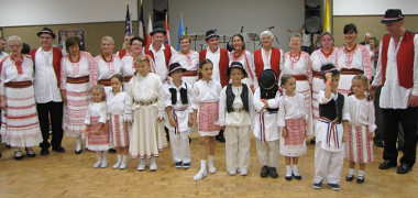 Croatian Folk group and children on the stage.