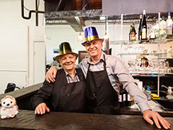 Bar tenders posing for a photo